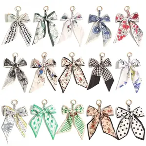 New Women's Creative Hand-Woven Silk Scarf Bowknot Keychain Charm — Stylish & Adorable Bag Accessory