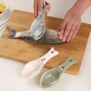 Kitchen tools Scale-scraping crafts, kitchen tools, flying fish shape with lid household scale-scraping utensils Cyan Stainless Steel