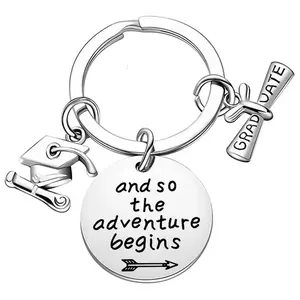 Graduate Keychain with inspired words 'and so the adventure begins'
