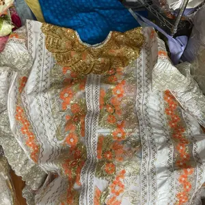 Bazin Grand Boubou - Elegant Floral Embroidered Dress with Gold Accents and White Lace Details