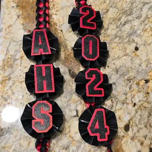 Graduation lei with school initals and year