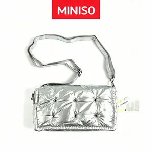 MINISO soft, puffy quilted mini handbag with bubble grid pattern — metallic shiny shoulder/crossbody bag, lightweight zippered small purse for women, Y2K style, suitable for daily wear and parties; available in black and silver