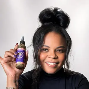 2 ounces hair booster oil with rosemary and 21 different types of herbs