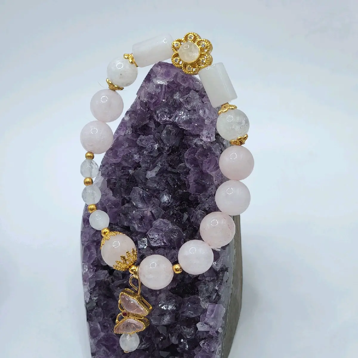 Rose Quartz, 4mm Faceted Clear Quartz & 12mm Rose Quartz Crystal Bracelet with Dangle Golden Butterfly Charm along with White Studded Golden Flower Charm & Gold Accents