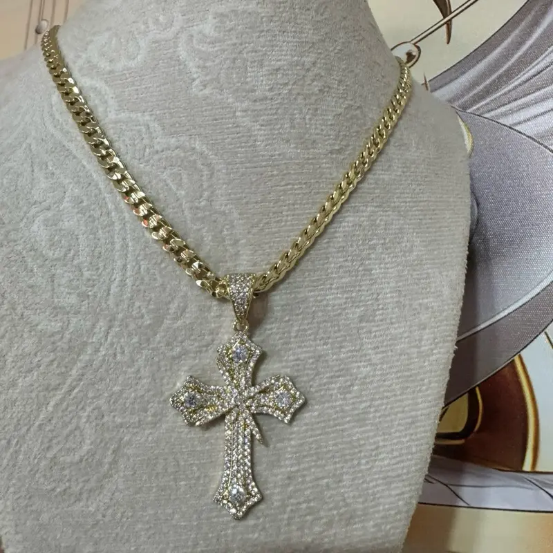 Cuban link chain with cross. Laminated in high quality 14k.