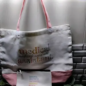 Medical Assistant Tote Bag and makeup bag- Educated Vaccinated Caffeinated Dedicated Medical Assisant - Pink Handles & White Canvas