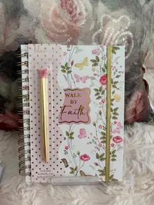 Pretty Writing Journal with Decorative Pen (some include stickers)Scroll through the photos- let me know which one you want please when ordering.
