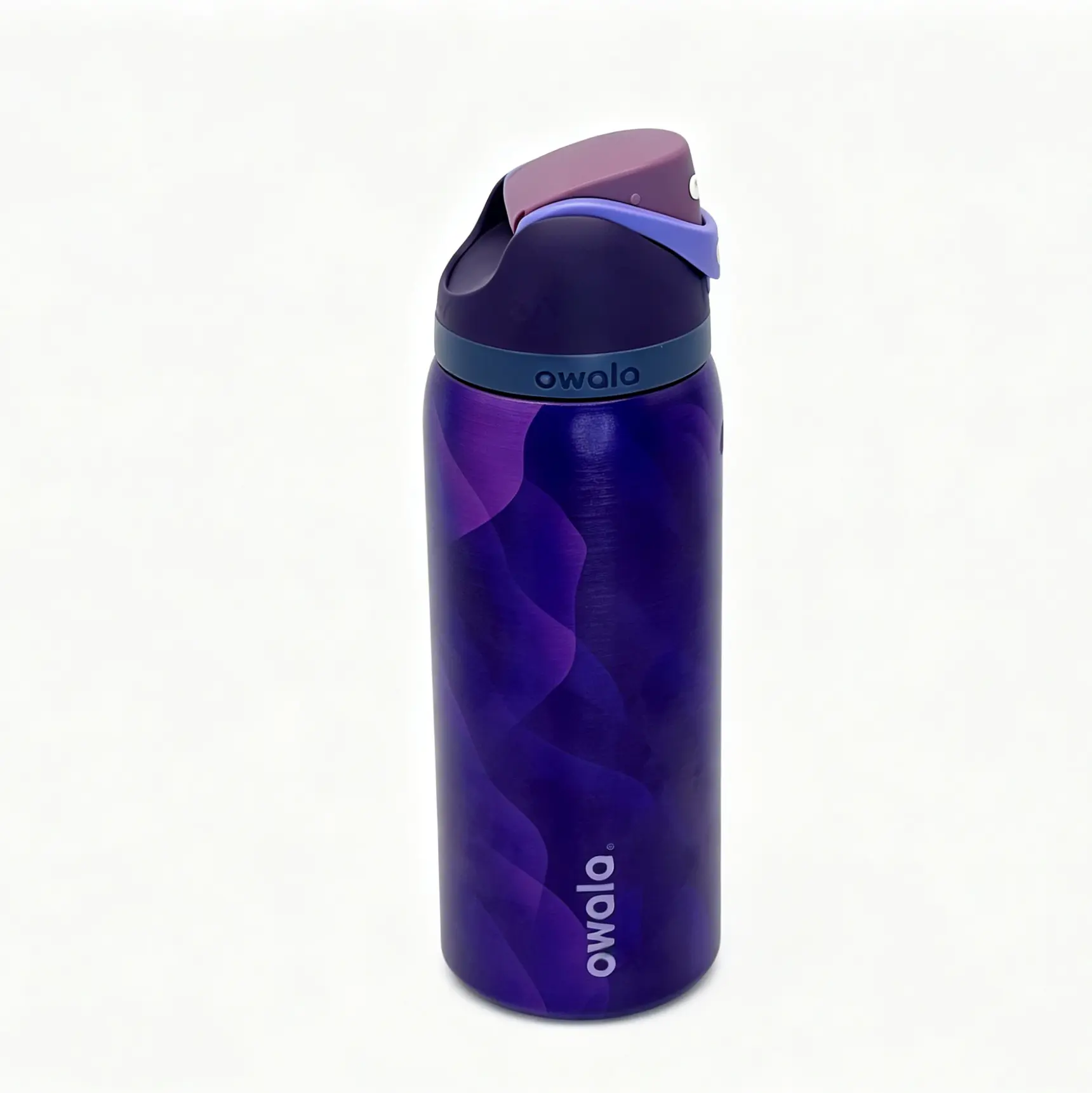 Owala FreedSip 32oz BPA-free stainless steel insulated water bottle, gradient purple design. Long-lasting hot and cold retention, equipped with carry snap loop. Portable cup suitable for travel, sports, office and outdoor use.