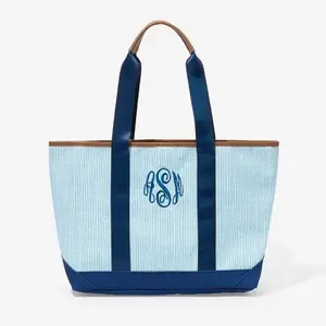 Monogrammed Boat Tote - Blue and White Striped Design with Navy Handles and Monogram Embellishment