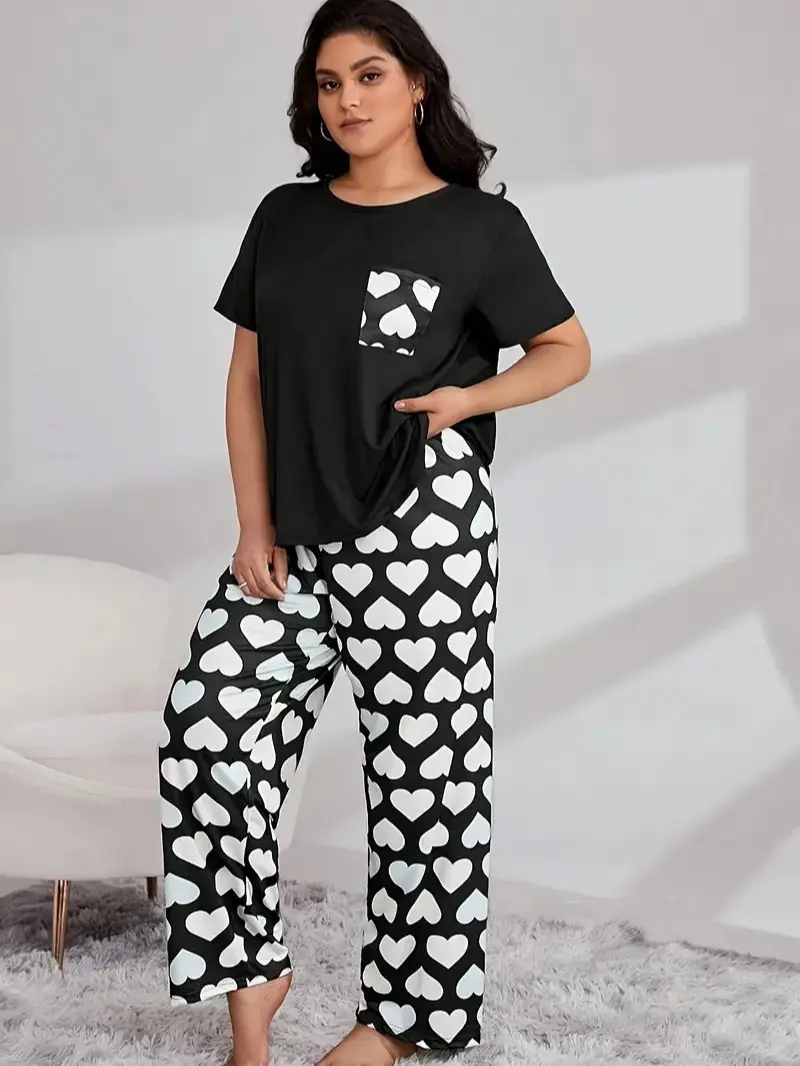 【Plus Size】COZY LOUNGE-Women's 2-Piece Lounge Set for Summer|Black & White Heart Print Lounge Set | Heart Pattern Pants + Short Sleeve Top | Comfy Relaxed Pajama Set