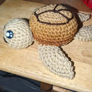 Ombre Baby Sea Turtle.  Busybelle handmade crochet amigurumi sea turtle with embroidered peace sign. Made with 100% acrylic yarn.