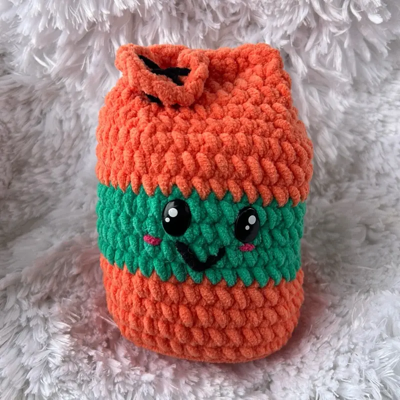 Handmade crochet carrot juice carton