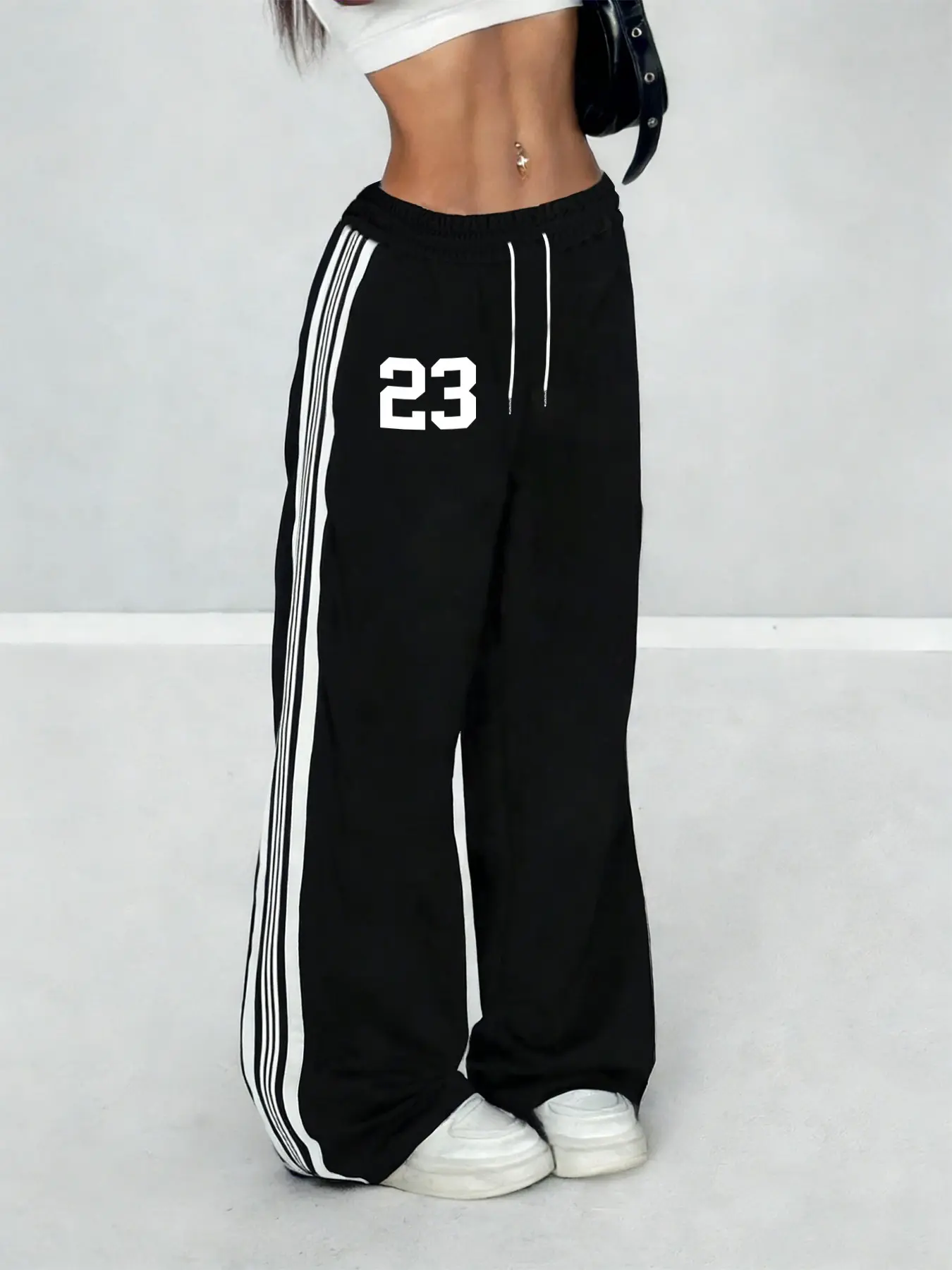 Y2K-style 23-striped wide-leg, High waist sweatpants, loose and comfortable, perfect for streetwear, dance outfits, and everyday looks, sporty vibe with 23 print and side stripe design, a must-have for TikTok fashion enthusiasts, Athleisure pants