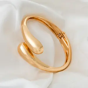 Golden Polished Chunky Twisted Hinged Waterdrop Bangle Bracelet for Women Spiraled Oval Bangle Bracelet