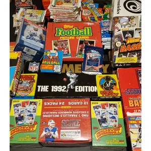 Lot of 100 multi/mixed-sport cards and non-sport trading cards in sealed packs