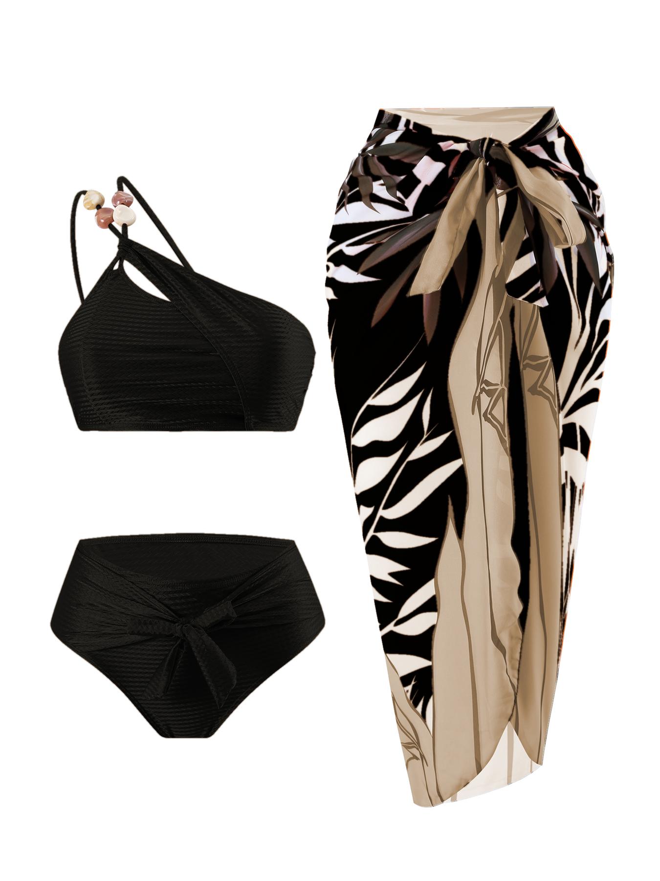 New European/American two-piece bikini swimsuit for women — sexy design with soft padding; three-piece set including a beach skirt, ideal for hot springs vacations.