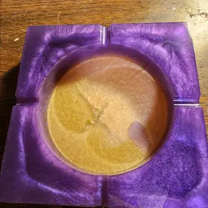 purple and gold ashtray