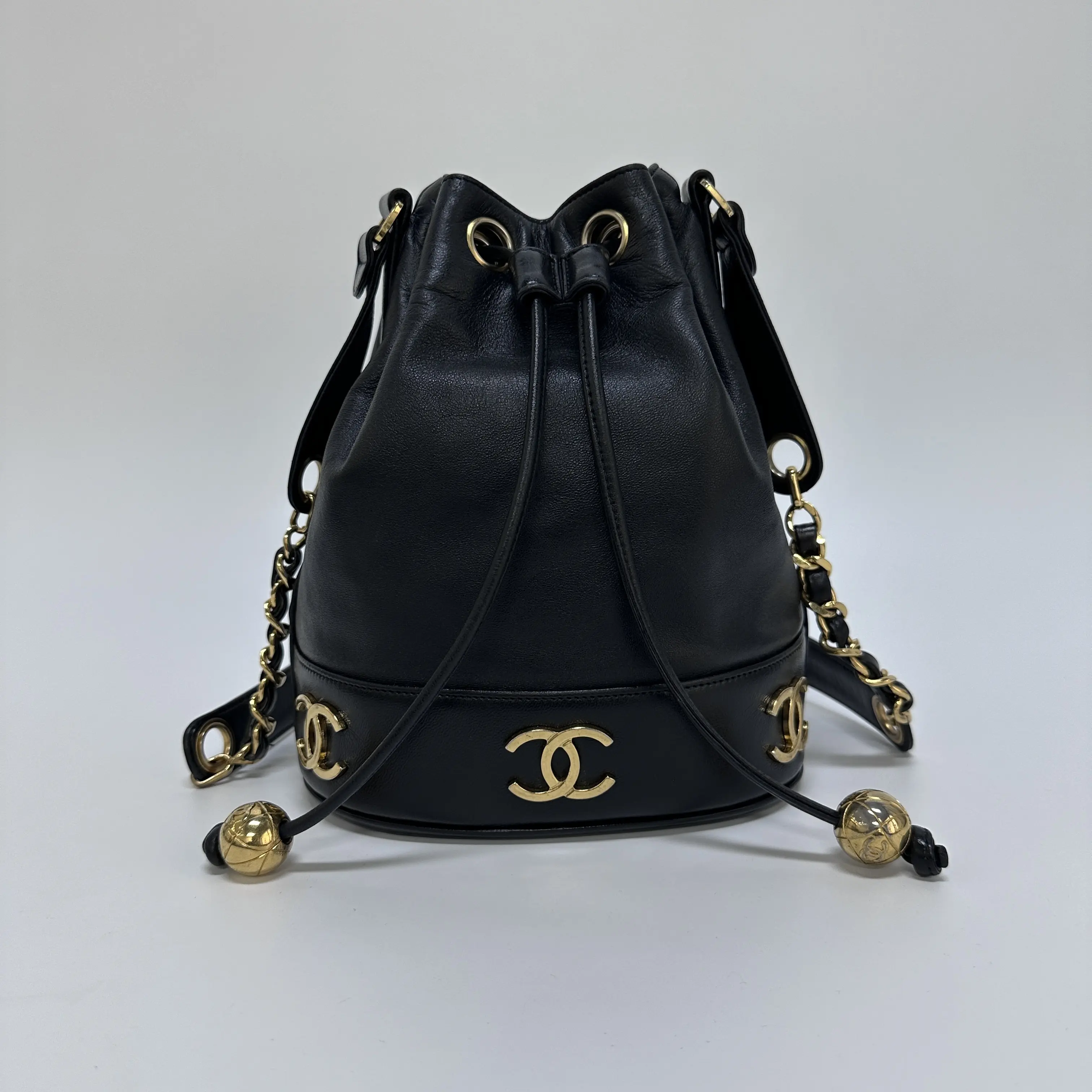 Pre-owned CHANEL Black Lambskin Triple CC Drawstring Bucket Bag Gold Ball Charm Chain