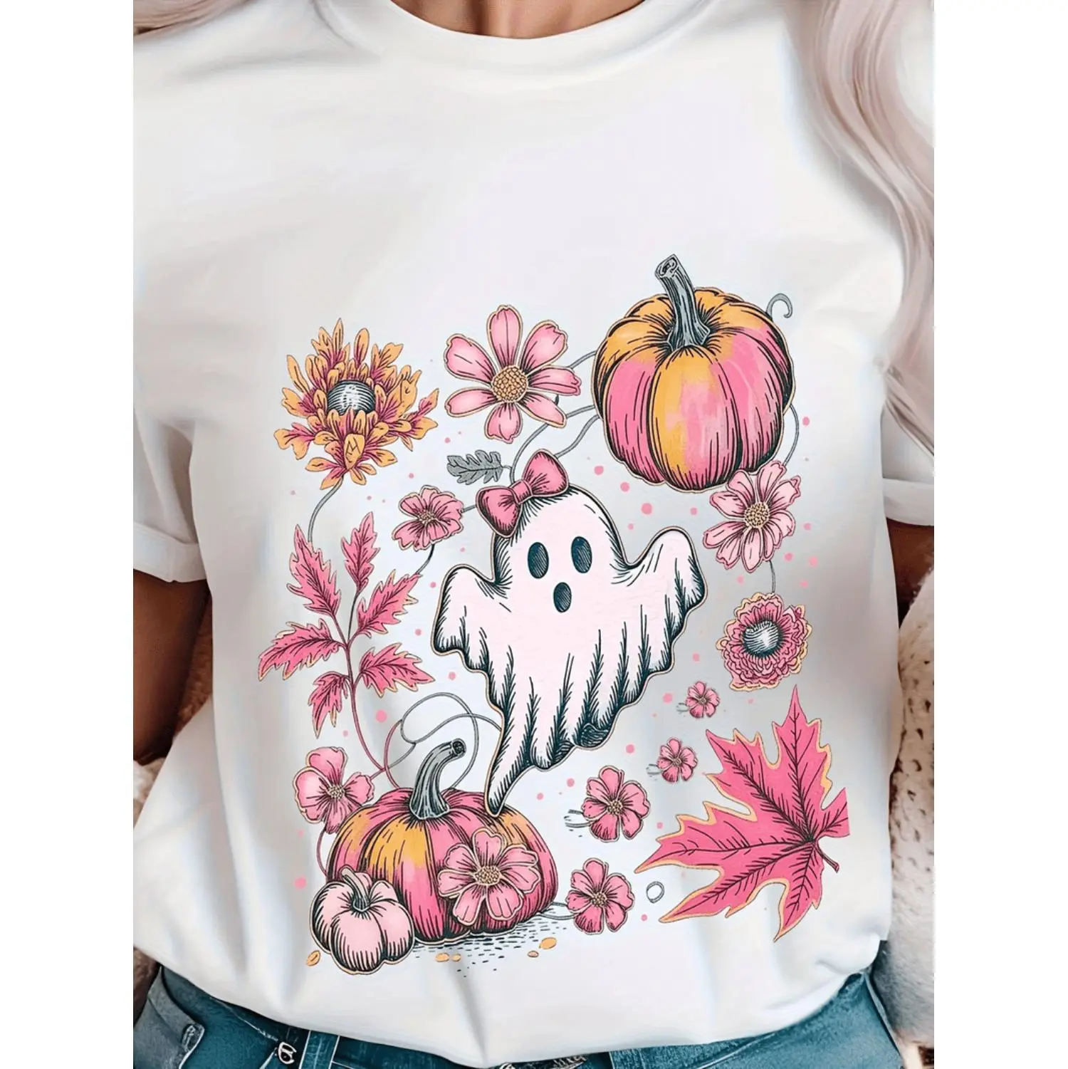 Floral Pink and Pastel Halloween T-Shirt for Women with Pumpkin Daisy and Skull Design Ideal for Autumn Gatherings and Casual Wear