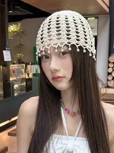 Women's Handcrafted Hollow Crochet Beanie with Floral Design, Stylish Summer Cap with Tassels, Versatile Knitted Headwear, Openwork Hat