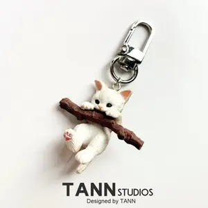 Cartoon cute cat holding a branch keychain, adorable three-dimensional corgi puppy pendant, bag accessory for male and female students