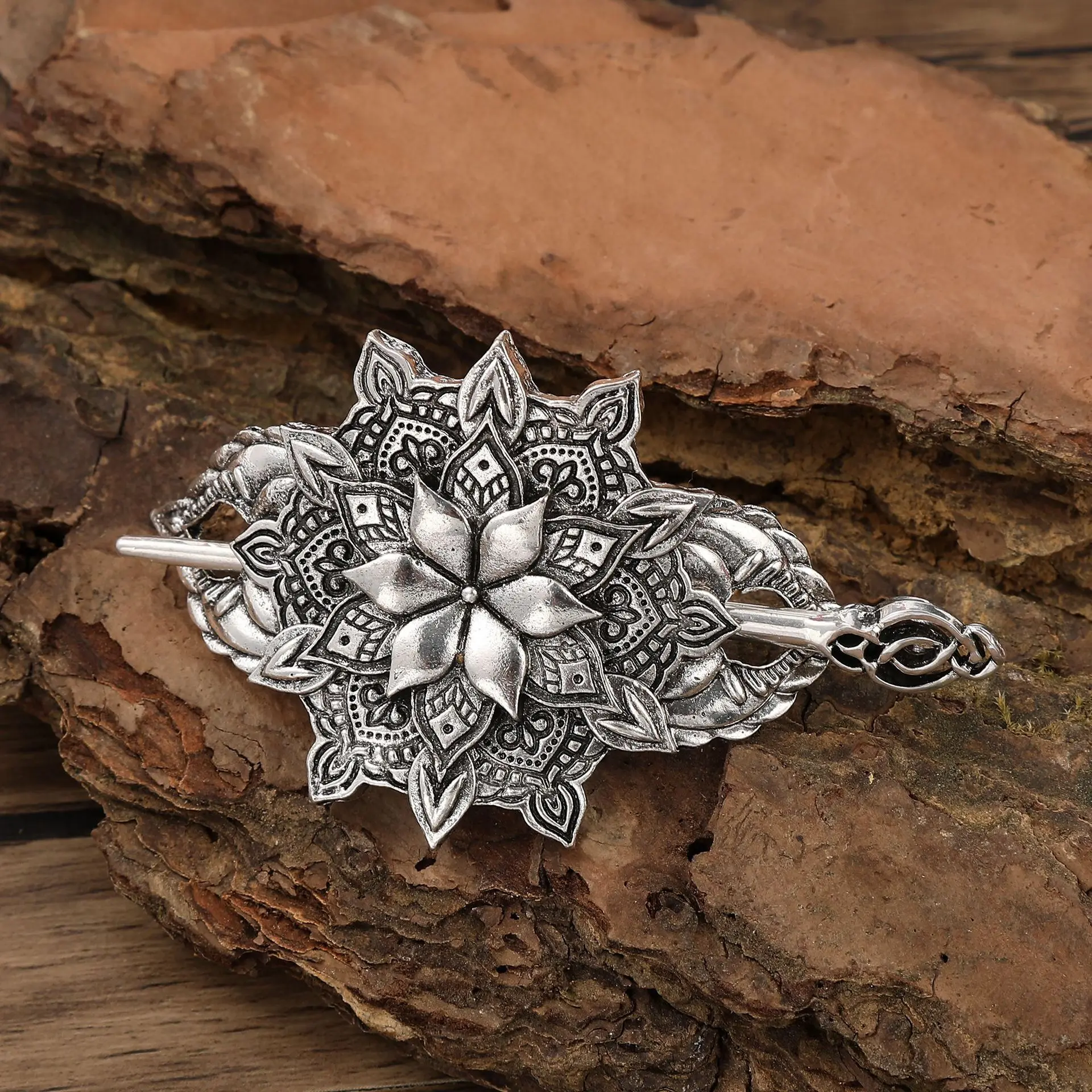 Silver flower shaped hair stick