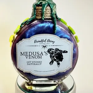 Medusa’s Venom - Potion Elixirs medusa Greek mythology spell witchcraft Wiccan pagan heathen asmr spell tarot zodiac altar snakes beauty purple green bottle stoned