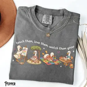 Comfort Colors Teach Them Love Them Watch Them Grow T-shirt – Preschool Pre-K Kindergarten First Grade Teacher Shirt, Goose Teacher Tee, Unisex Teaching Shirt