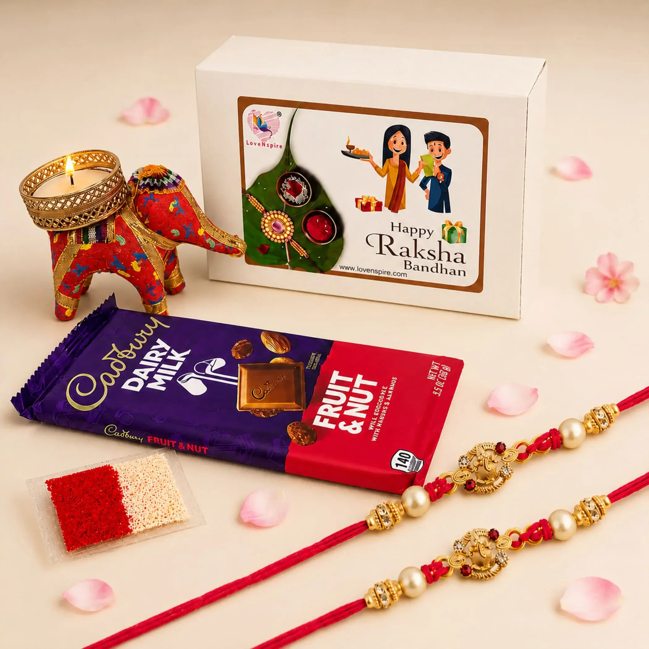 Cherished Rakhi Gift Hamper | Ganesh Rakhi Set with Gifts, Chocolate & Candle | Celebrate Raksha Bandhan with Bhabhi & Bhai | Symbol of Love