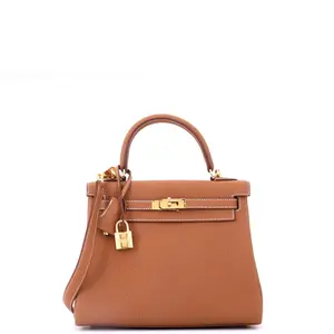 Pre-owned HERMÈS Leather Top Handle Bags Hermes Kelly Handbag Gold Togo with Gold Hardware 25 by Rebag