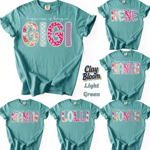 Custom Comfort Colors Grandma Shirt | Personalized Floral Nana Mimi Gigi Auntie Grammy Lolli T-Shirt | Mother's Day Gift with Grandkids Names | Aesthetic Flower Alphabet Tee | Premium Soft Garment-Dyed Cotton Shirt for Grandmother - By Clay Bloom