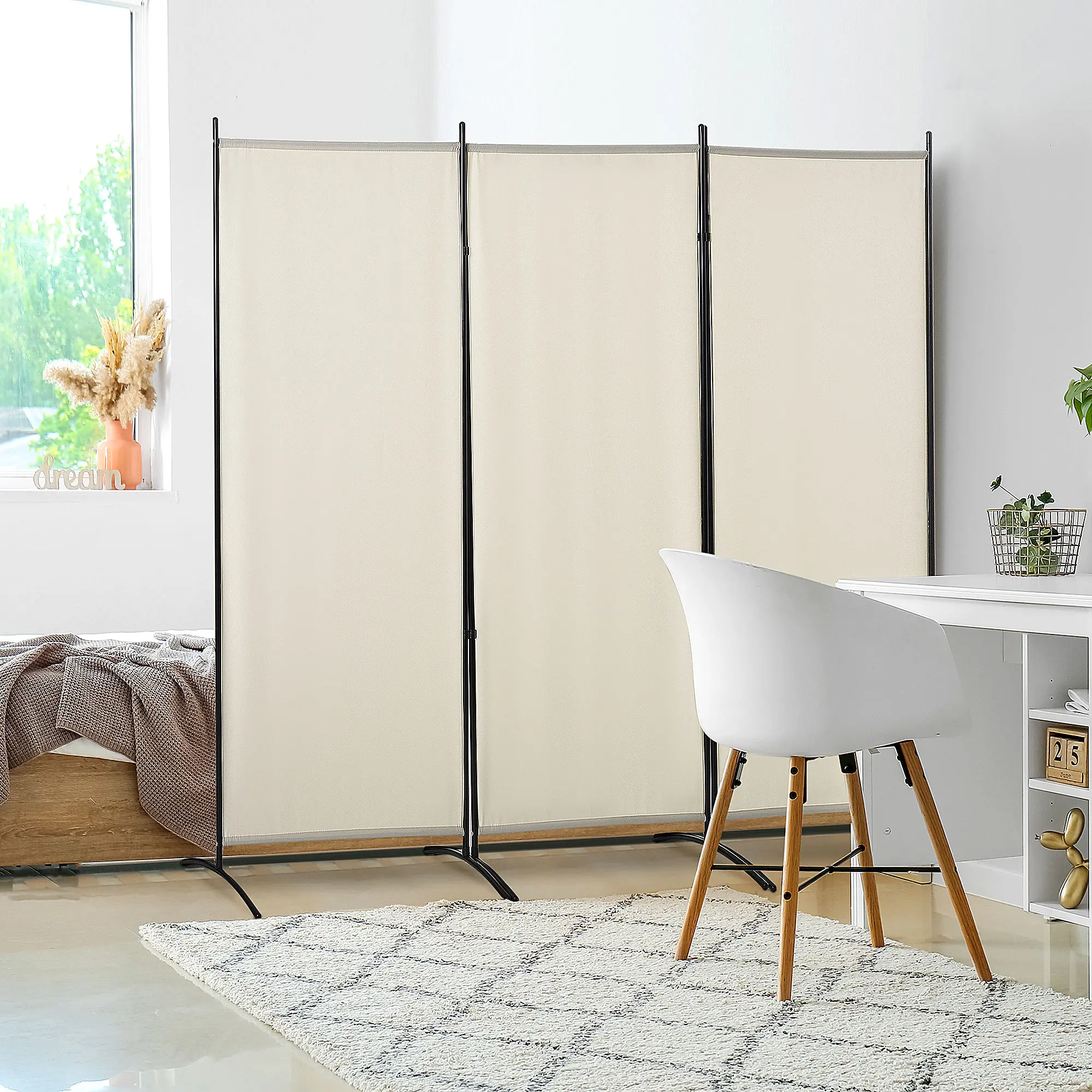 Neutral minimalist beige freestanding three panel room divider flexible foldable design easy for one person to rearrange layout and build quiet private resting nook inside open layout bedroom interior space