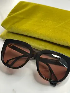 Pre-owned Gucci tortoise sunglasses with gold hardware