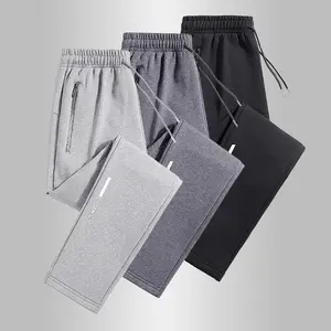 Men's three-pack sweatpants — elastic waistband with drawstring, zippered pockets, perfect for everyday wear Men's three-pack sweatpants — elastic waistband with drawstring, zippered pockets, perfect for everyday wear