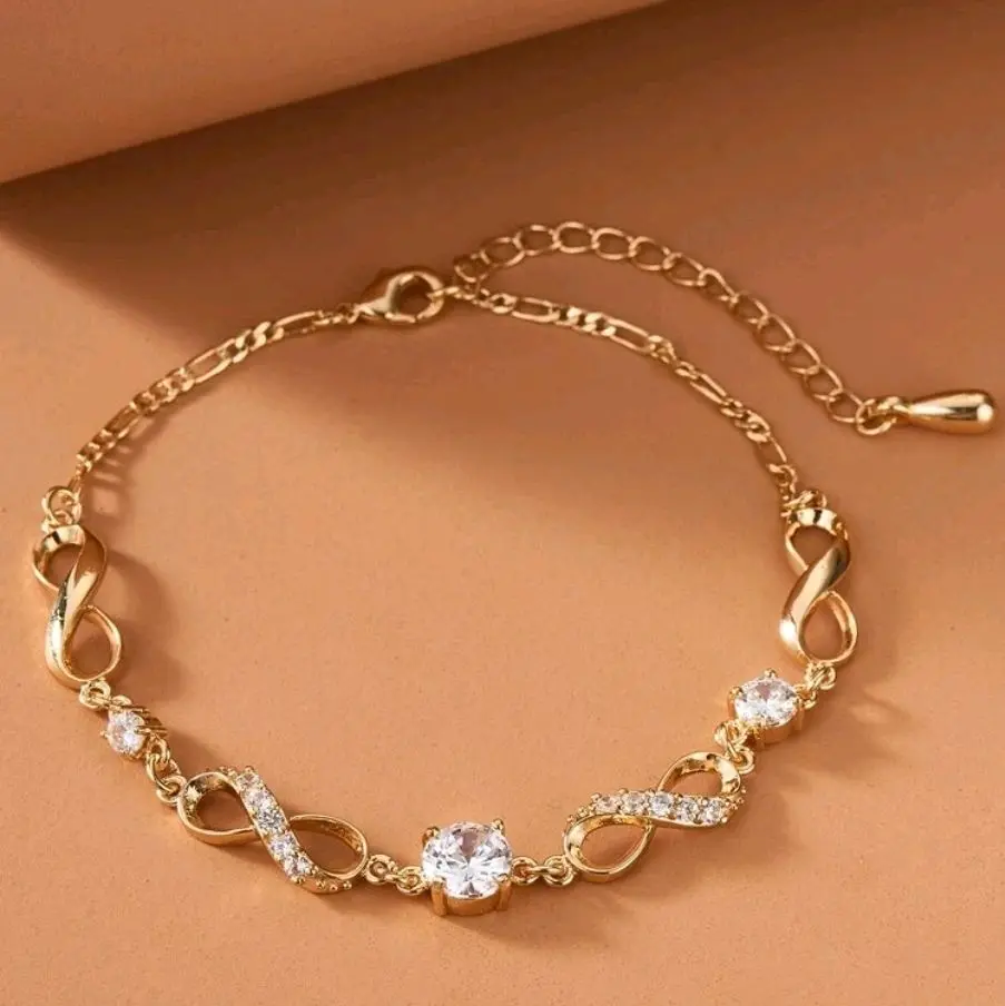 Rhinestone Decor Bracelet with Cubic Zirconia Perfect for Birthday Gifts Gold and Silver Tone Infinity Design Trendy Fashion Jewelry