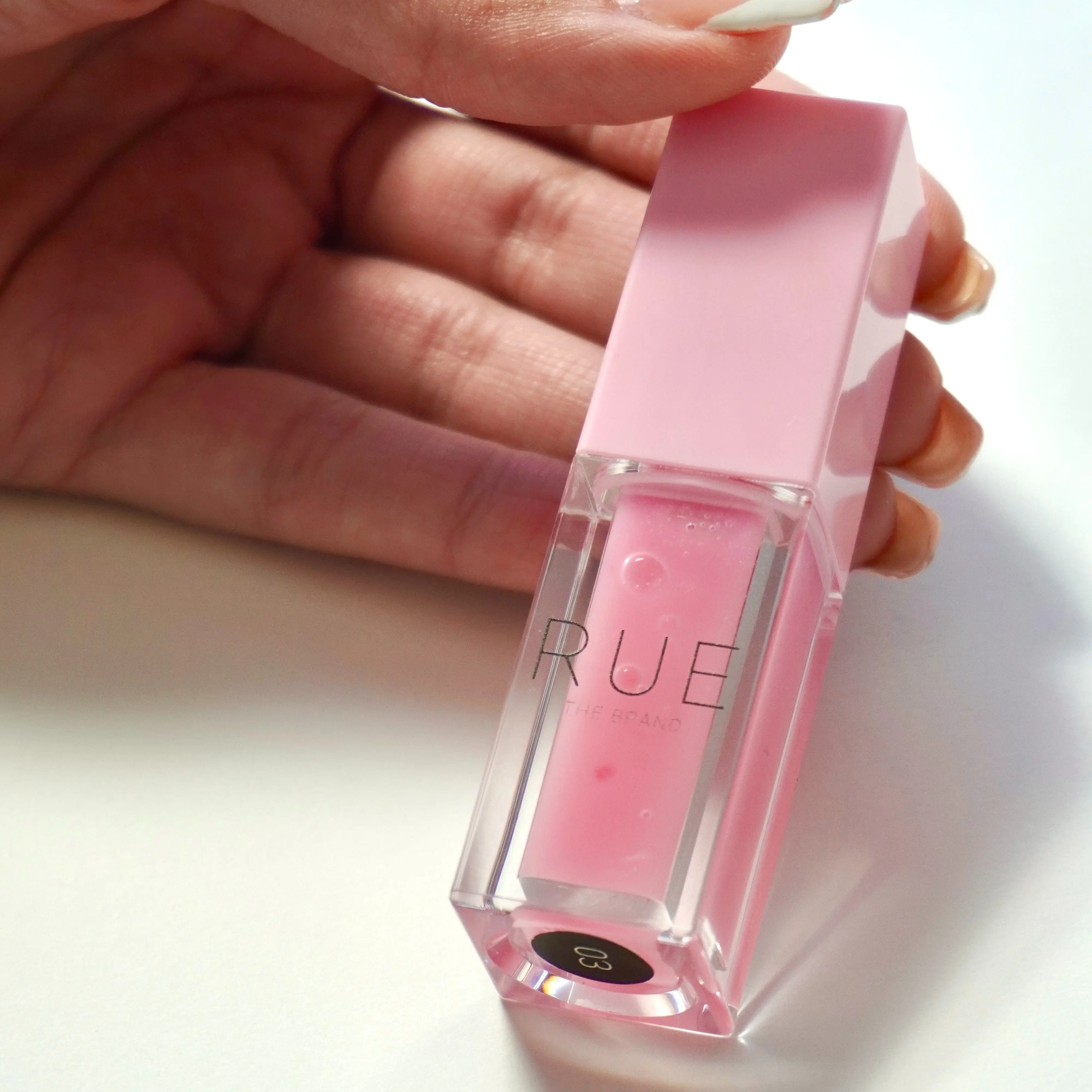 RUE COLOR CHANGING LIP GLOSS
