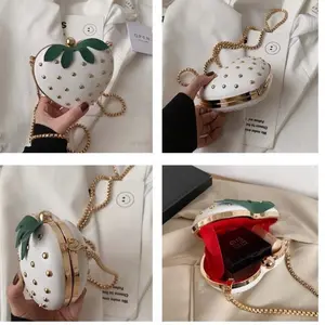 Strawberry sling bag in white and red