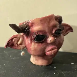 Creepy Doll Candle Holder - Unique Decorative Figure with horns and Earrings