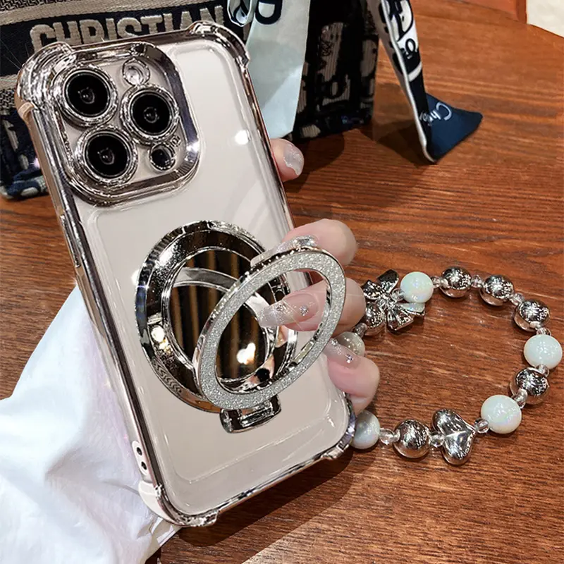 Women's Phone Case with Mirror & Stand for iPhone&Samsung. Features a silver chrome alloy frame, high-definition transparent material, reinforced corner protection, and full-body drop-resistant design.