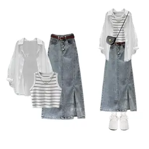 Springtime minimalist style: Loose-fitting, versatile shirt, slightly mature striped vest, and high-waisted, slimming denim skirt three-piece set