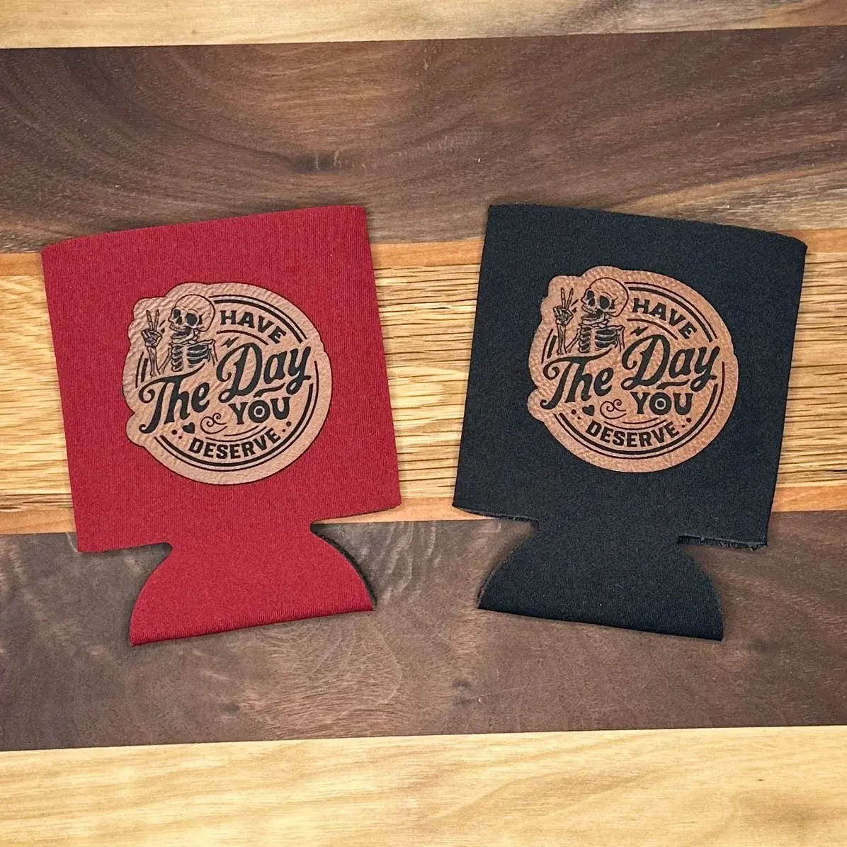 2 pack have the day you deserve leather patch koozies.