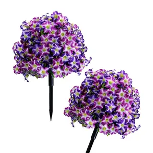 1/2 set of spring-type outdoor artificial flowers: wisteria and morning glory-style spherical green plants with stands. These purple, UV-resistant artificial plants are ideal for use in front door wreaths, porches, or as hanging flower baskets.