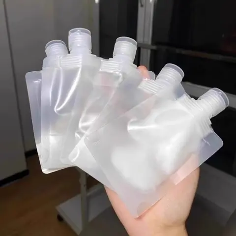 12Pcs Transparent Portable Fluid Packing Bags,New Travel Size Refillable Empty Squeeze Pouch, Premium Clear Travel Pouches for Toiletry, Lotion Shampoo Shower Gel Squeezable Bags (50ml),Bag and Cases