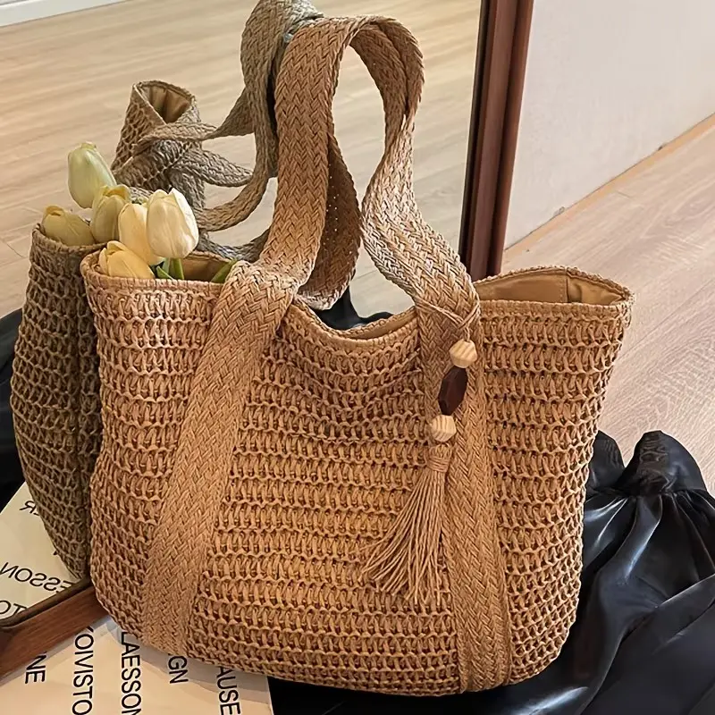 New Women's Stylish Solid-Color Hand-Woven Straw Shoulder Bag — A Summer Vacation, Travel, and Beach Tote. This versatile handbag is perfect for work, shopping, and dining out, making it an ideal gift for family and friends.