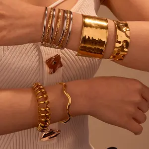 APRIL Gold Plated Bangle Bracelets For Women Open Hinged Chunky Polished Cuff Minimalist Twist Grooved Design Perfect For Everyday Wear gold-plated stainless steel bracelet