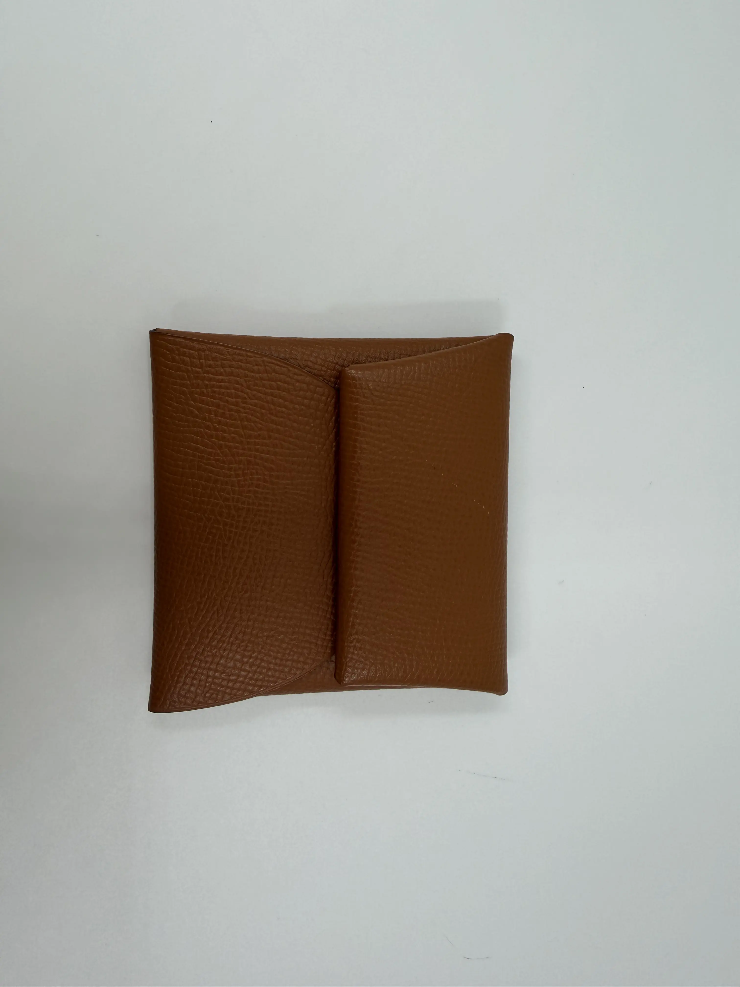 Pre-owned HERMÈS calfskin Clutches & Wristlets Hermes Bastia Coin Purse Gold Brown Clemence Leather Foldable Change Wallet with Snap Closure B2329663001