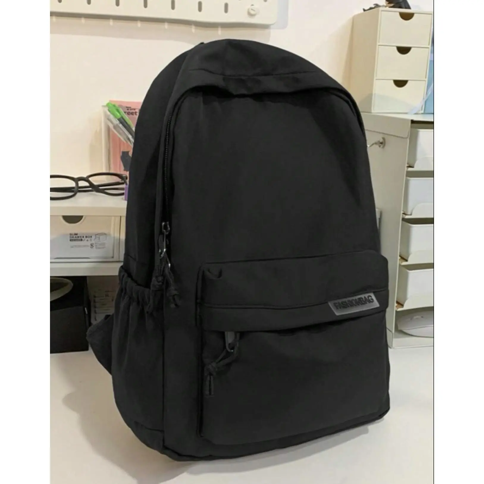 Black Backpack with Multiple Pockets and Zippers for Everyday Use