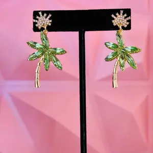 Fashion crystal green. Palm tree earrings. Adding a good Caribbean vibe. Stainless steel