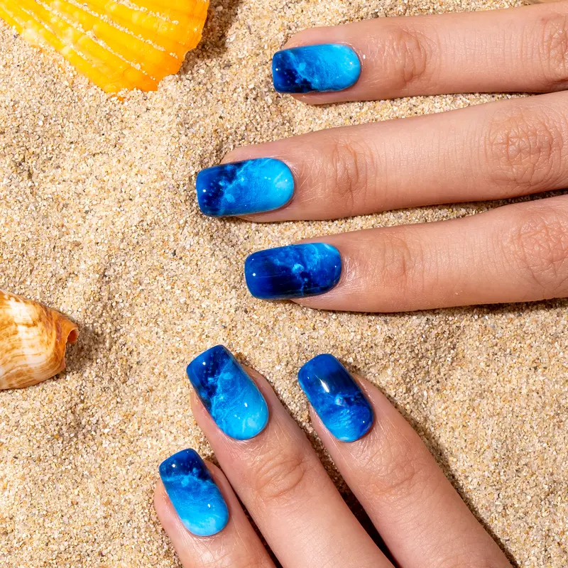 Blue Cosmos Press On Nails | CurvLife Nail | 24pcs Medium Coffin Fake Nails | Glossy Finish with Cosmic Swirls & Starry Glitter Accents | Easy to Apply, Comfortable & Long-Lasting | Great for Dinners, Galas, Concerts & Starry Night Events