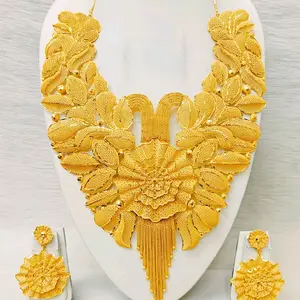 Big gold plated necklace set with earrings and ring.